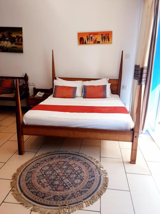 במבורי Cowrie Shell Beach Apartments Official מראה חיצוני תמונה