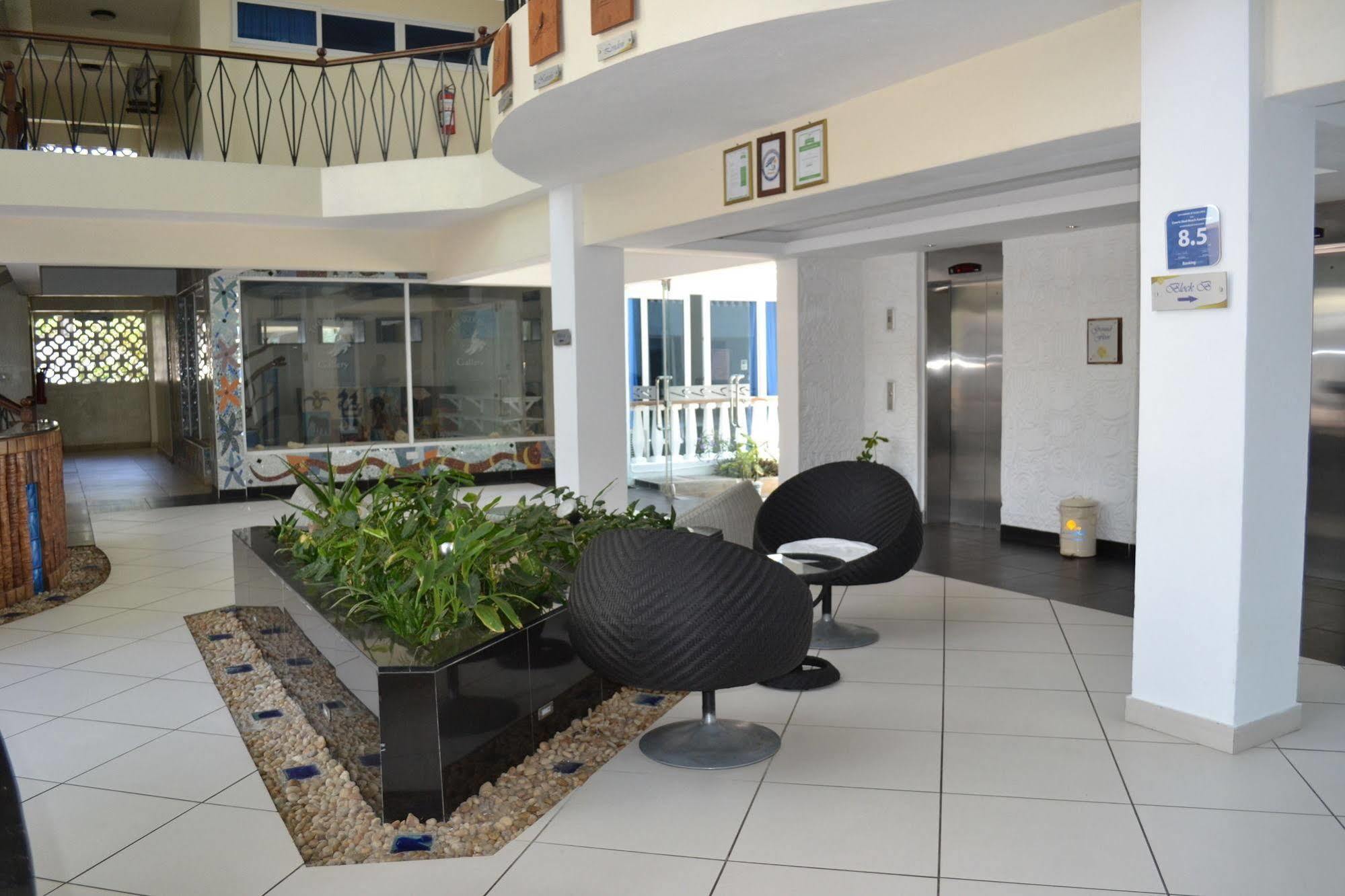 במבורי Cowrie Shell Beach Apartments Official מראה חיצוני תמונה